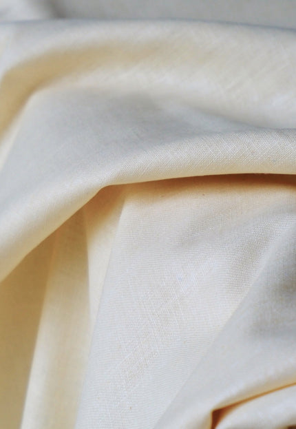 Close-up of beige fabric with a soft texture